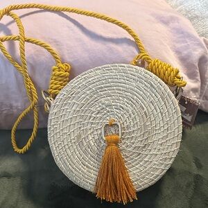 Elegant Woven Crossbody Bag with Mustard Tassel